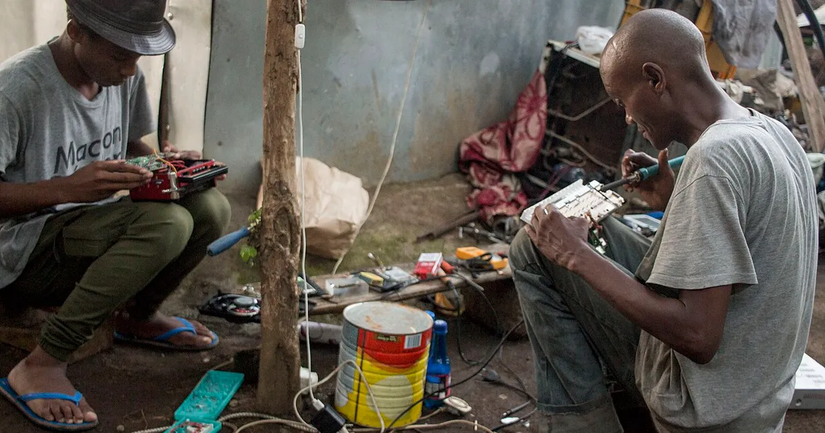 Technician repairing electronics